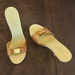 bebe Metallic Bronze Slide Mules with Gold Buckle
